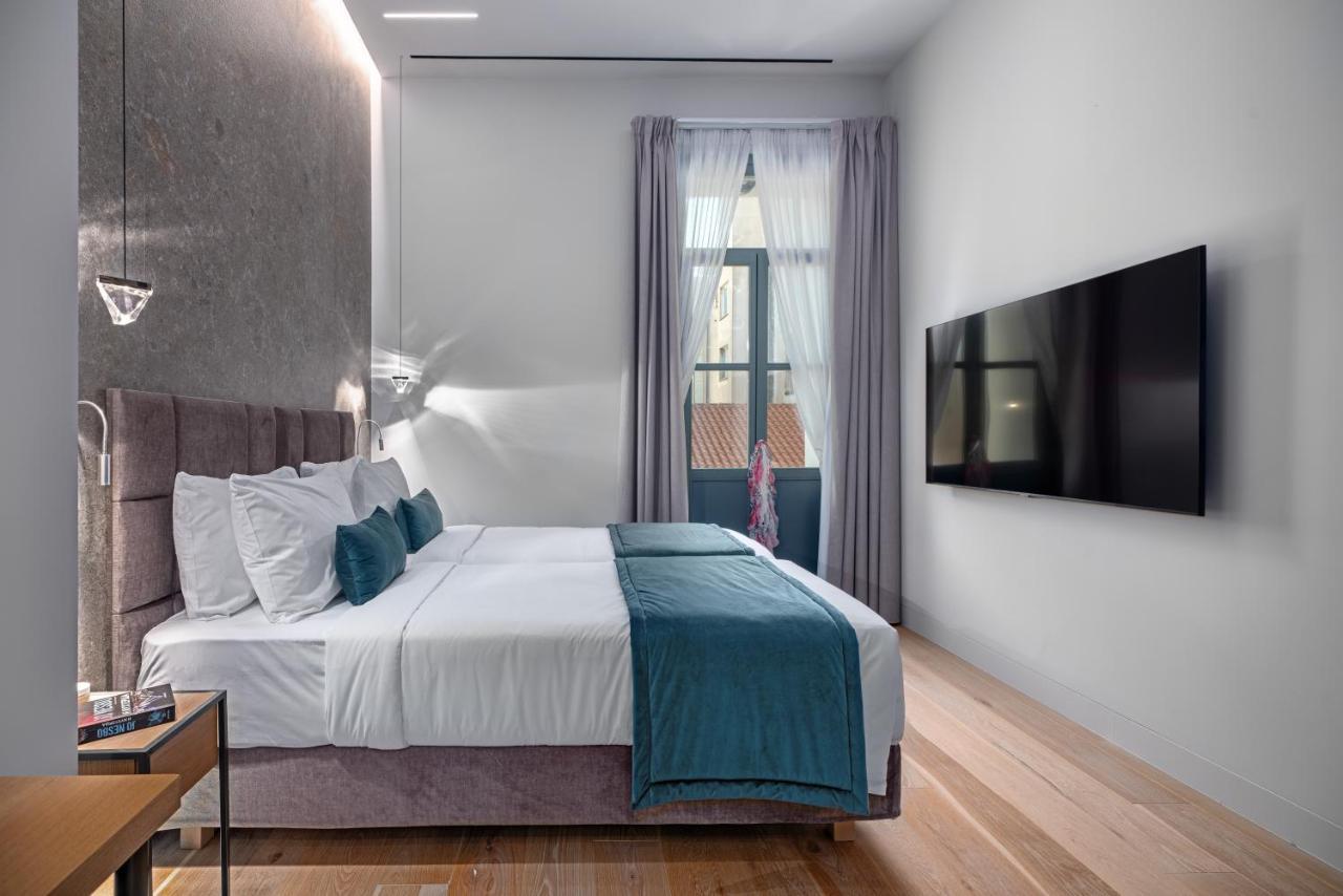 Hellenic Vibes Smart Hotel Atene Esterno foto A room at the hotel