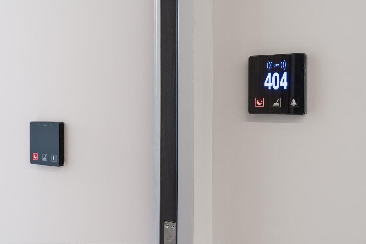 Hellenic Vibes Smart Hotel Atene Esterno foto Room control panel