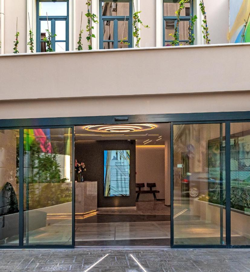 Hellenic Vibes Smart Hotel Atene Esterno foto Entrance to the hotel