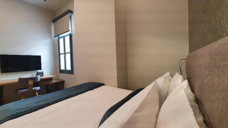 Hellenic Vibes Smart Hotel Atene Esterno foto A room at the hotel