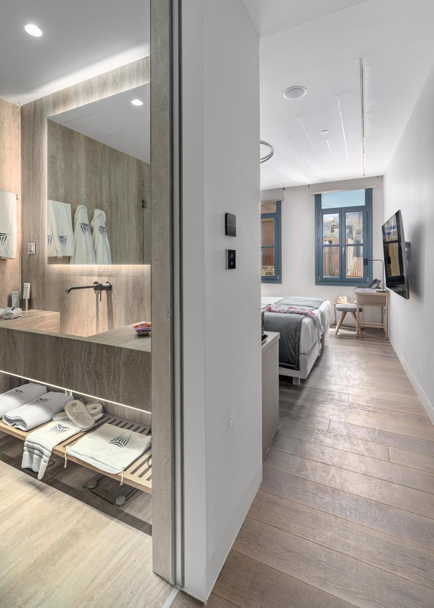 Hellenic Vibes Smart Hotel Atene Esterno foto A room at the hotel